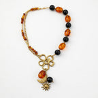 Éclipse Dorée – Collier Nuit Ambrée en Acier Inoxydable